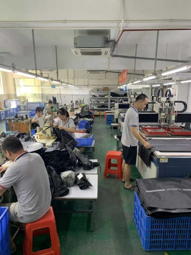high-frequency welding line and sewing line in adjacent rooms, with many cooler builds combining both processes